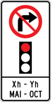 Sign with an arrow curved to the right with a red diagonal bar through it set above a red traffic light. The sign has a tab below it listing specific hours and months. This sign indicates that it is prohibited to turn right when the traffic light is red and specifies the hours and months during which the prohibition is in effect.