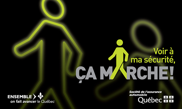 Affiche « Voir à ma sécurité » installée sur des palissades de construction de la ville de Montréal