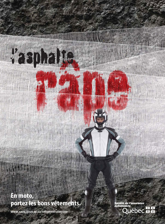 Publicité imprimée intitulée « L'asphalte râpe. En moto, portez les bons vêtements. »