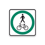 Panneau de signalisation indiquant un trajet obligatoire pour vélos et piétons